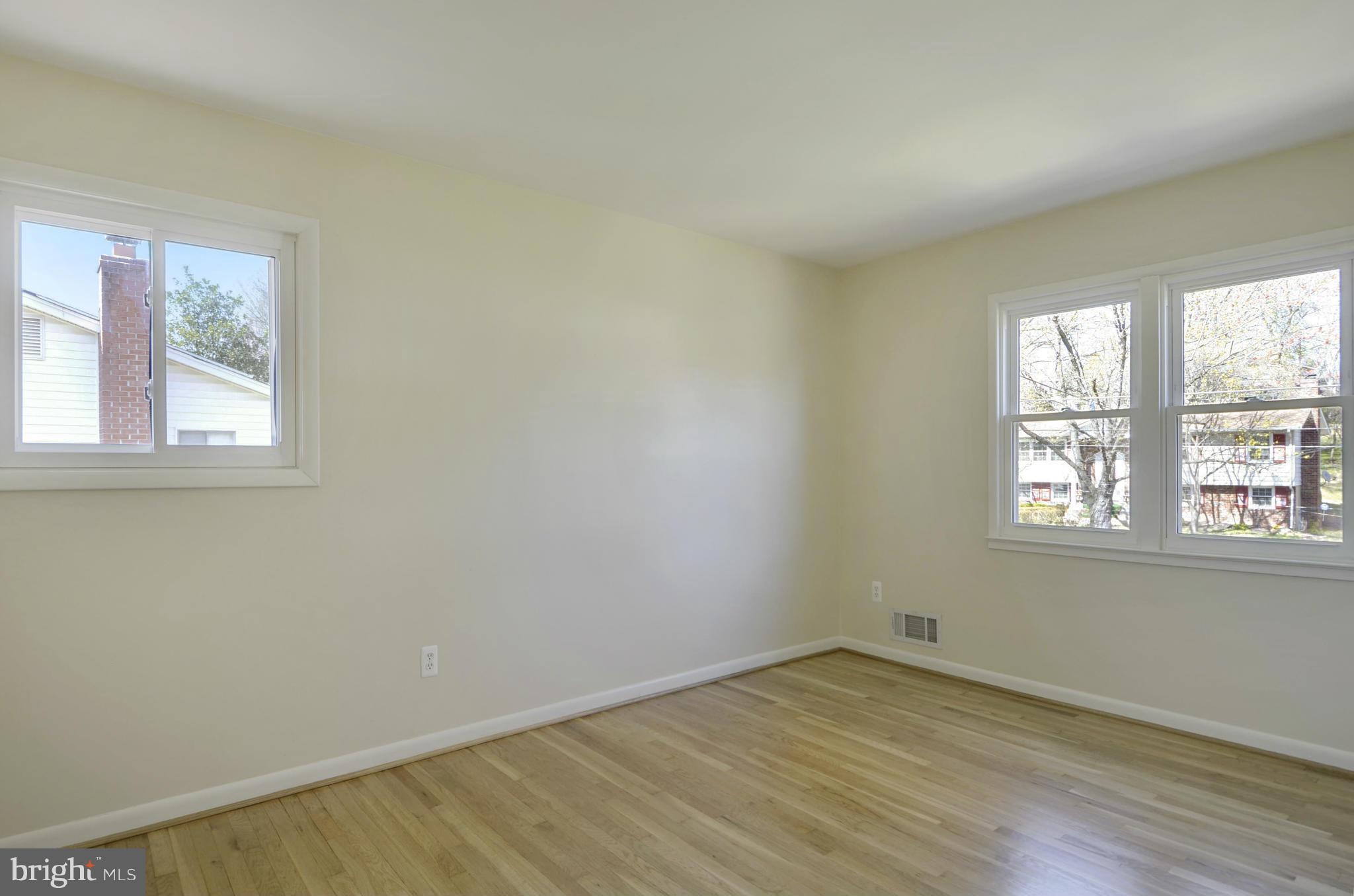 5404 Manorfield Road Rockville, MD 20853 - Photo 20 of 30 Bedroom Two w/refinished hardwood floor