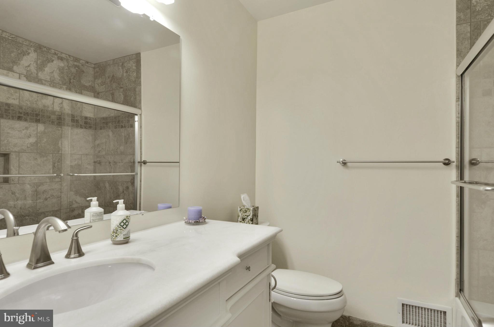 5404 Manorfield Road Rockville, MD 20853 - Photo 21 of 30 Updated ceramic Hall Tub Bath w/glass doors