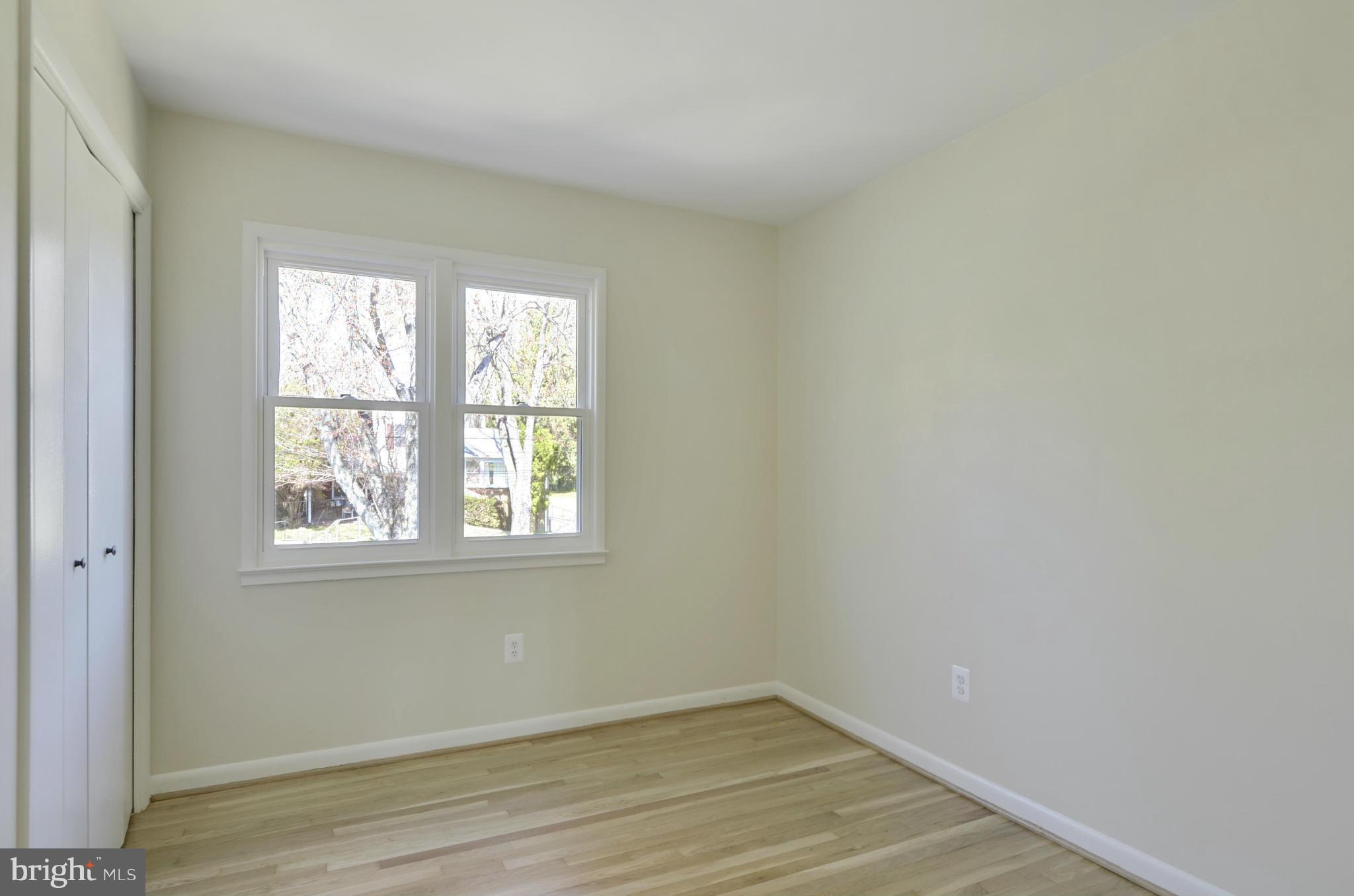 5404 Manorfield Road Rockville, MD 20853 - Photo 22 of 30 Bedroom Three w/hardwood floor