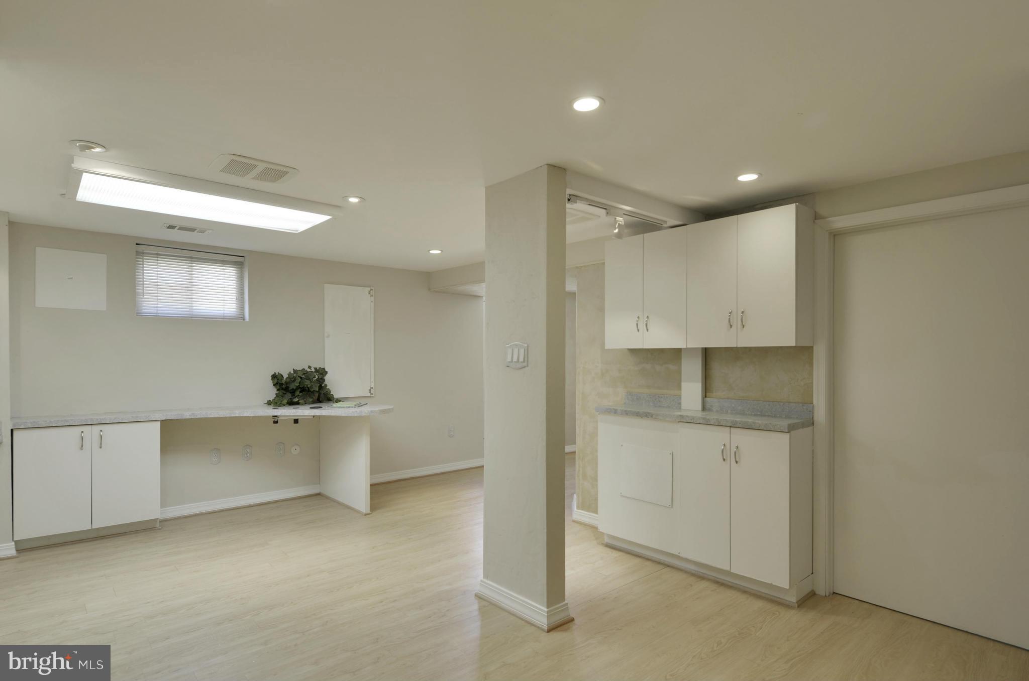 5404 Manorfield Road Rockville, MD 20853 - Photo 25 of 30 LL w/laminate floor, built ins