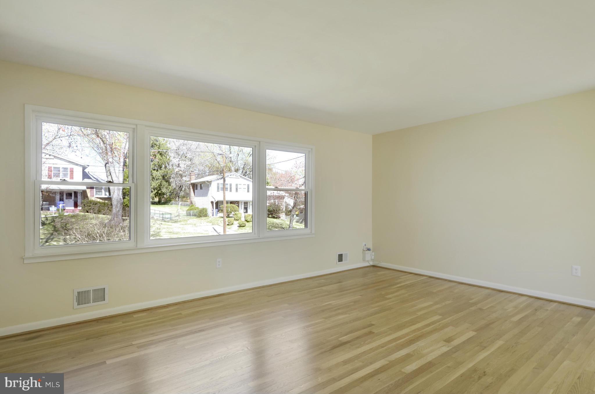 5404 Manorfield Road Rockville, MD 20853 - Photo 5 of 30 Living Room w/refinished white oak hardwood floor