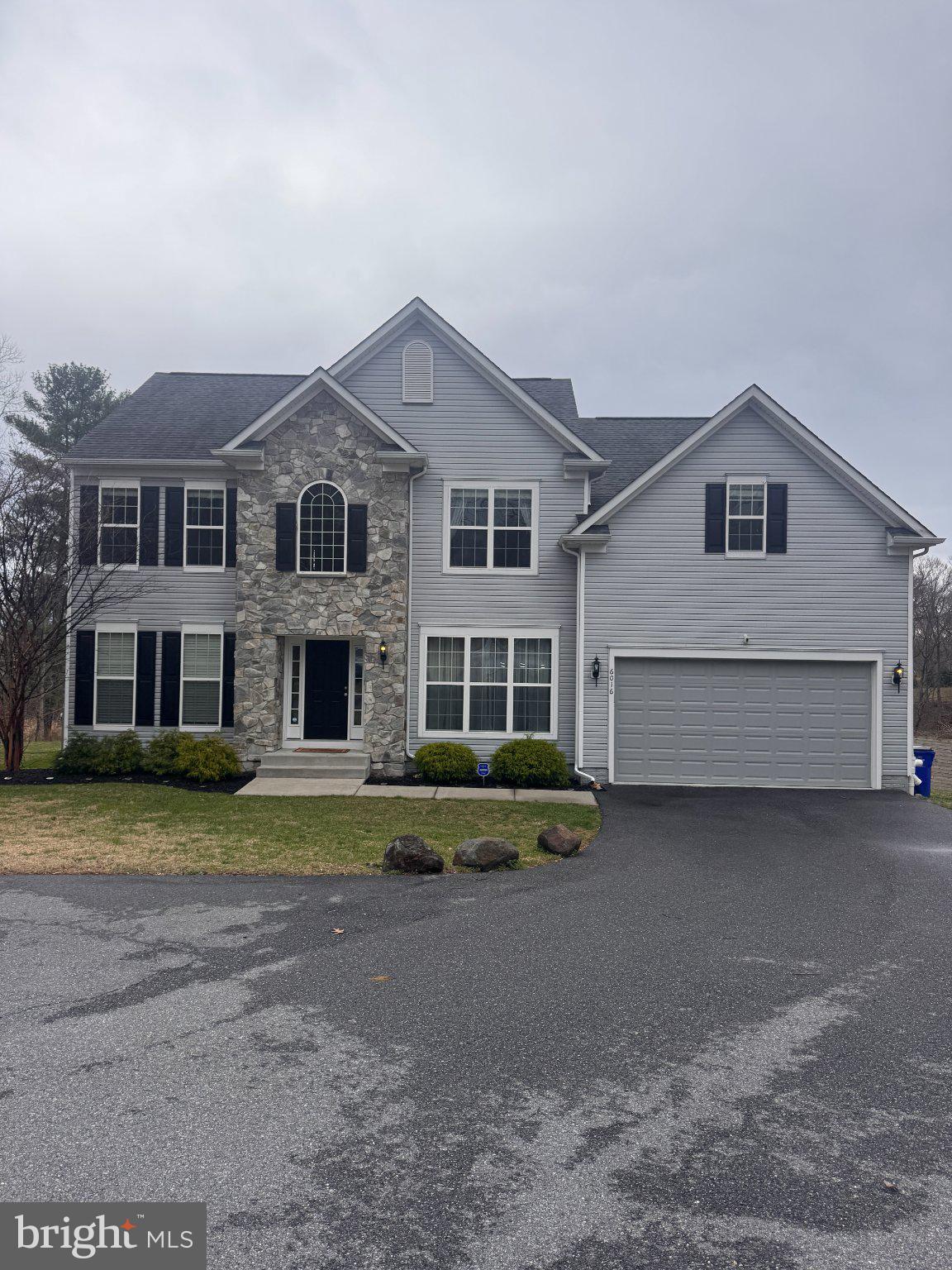 Elegant home with stone accents.
