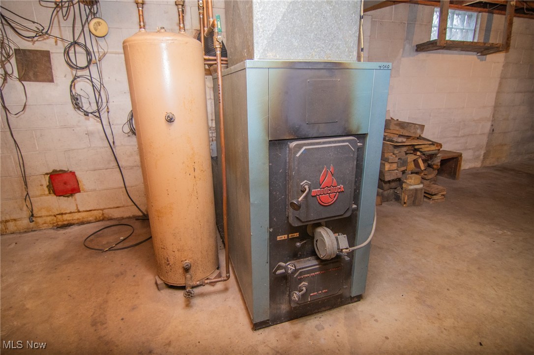 55992 Mt Victory Road Powhatan Point, OH 43942 - Photo 19 of 44 Utilities with gas water heater and heating unit