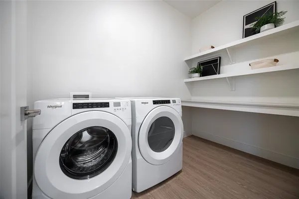 a utility room with dryer and washer