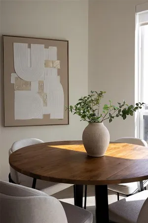 a vase of flowers sitting on a table