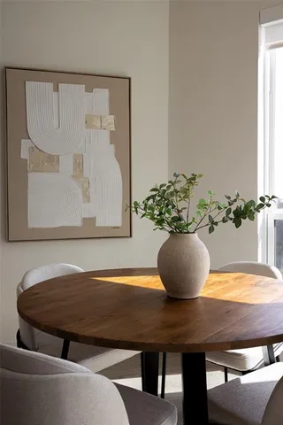 a vase of flowers sitting on a table