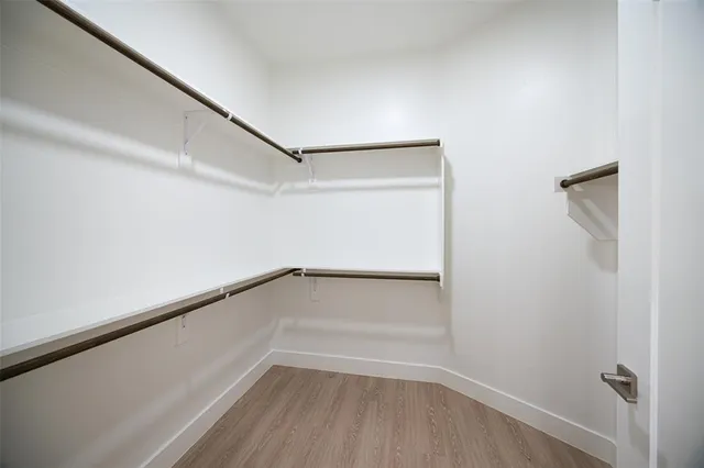 a view of an empty walk in closet