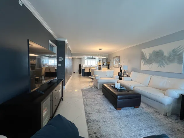 a bed room with a bed and a large mirror