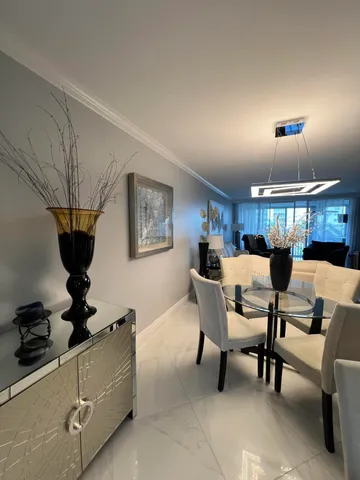 a bedroom with a large bed and a large window