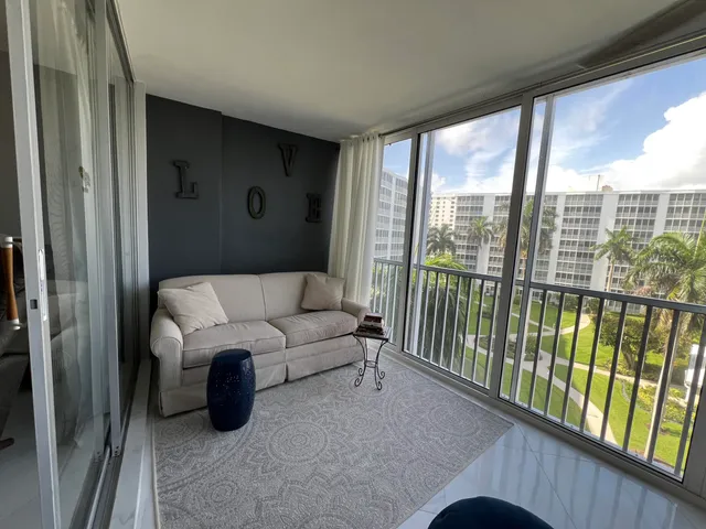 a bathroom with a sink a toilet a mirror and vanity
