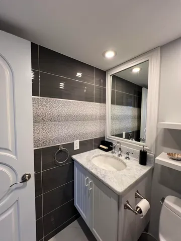 a small garden filled with lots of potted plants