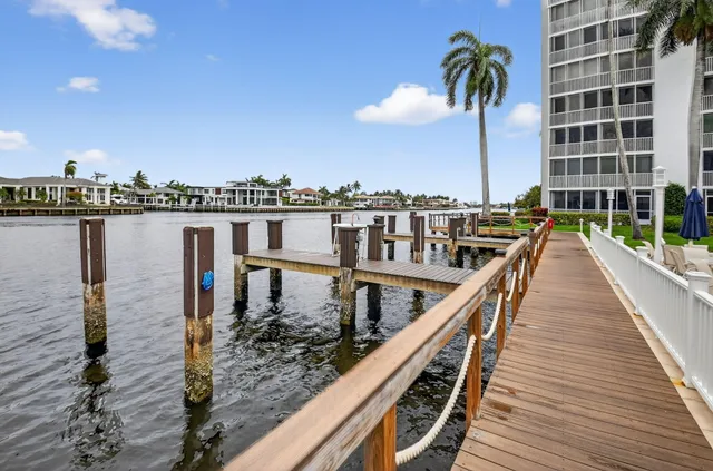 a house with swimming pool in front of it