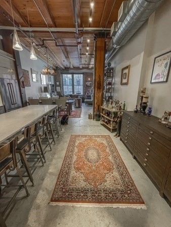 a large room with lots of wooden furniture