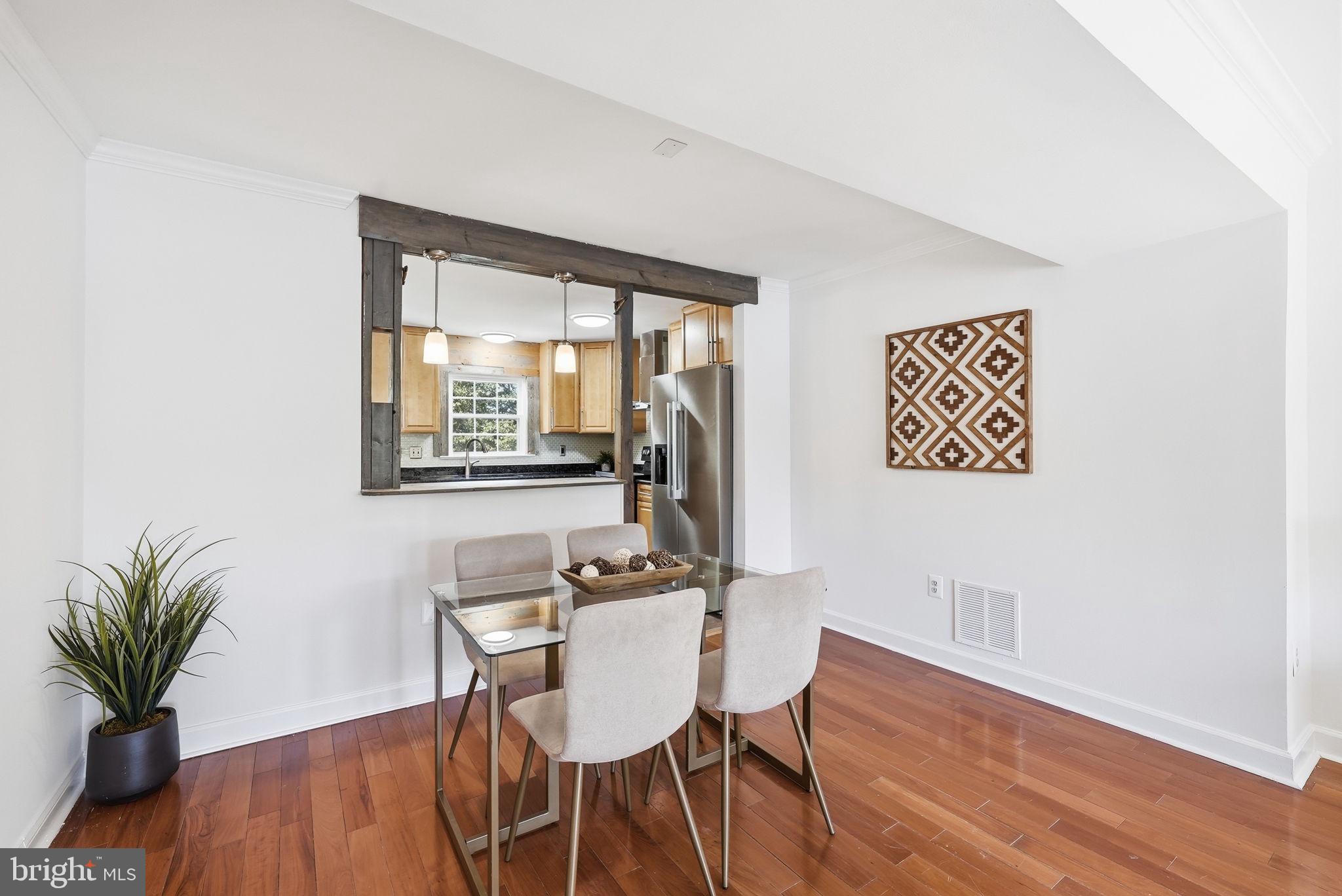 8074 Powderbrook Lane Springfield, VA 22153 - Photo 12 of 52 Dining Room conveniently adjacent to Kitchen.