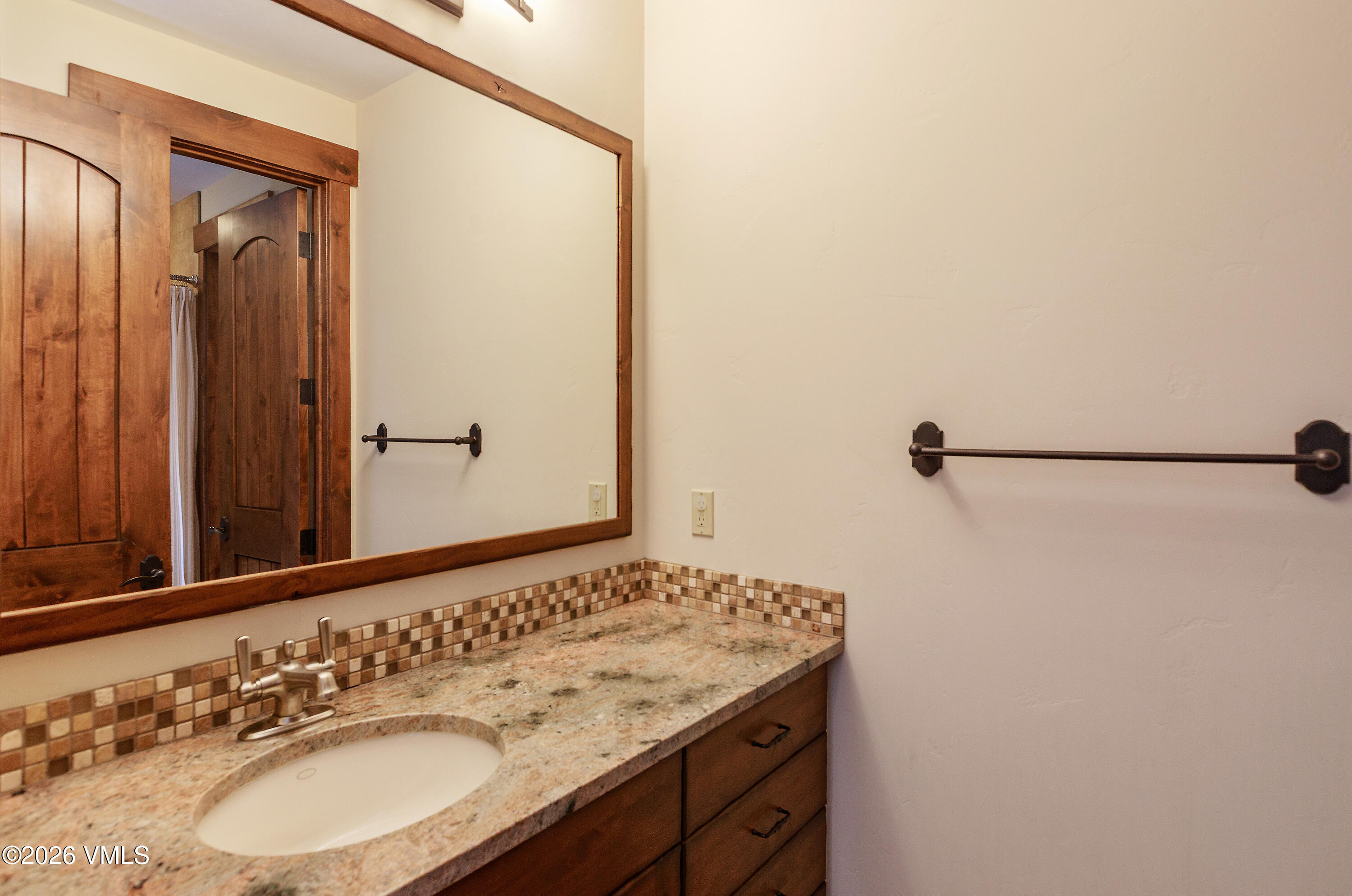 2753 East Haystacker Drive Eagle, CO 81631 - Photo 35 of 41 a bathroom with a sink and a mirror