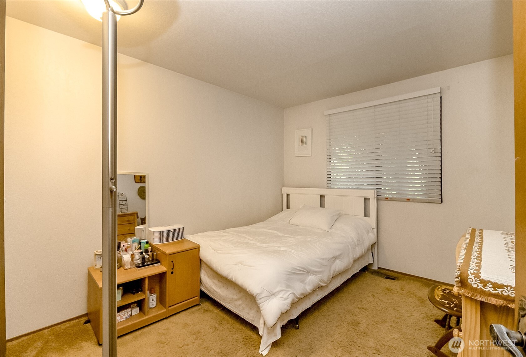 22121 4th Avenue Southeast Bothell, WA 98021 - Photo 19 of 22 a bedroom with a bed and a window