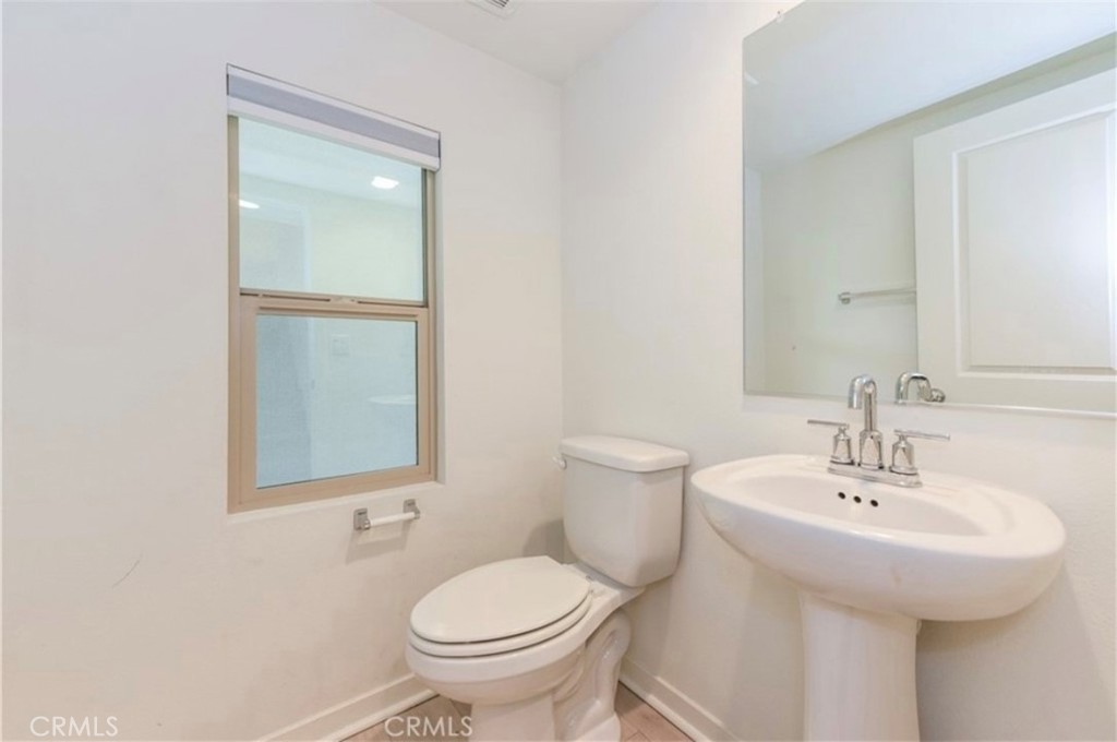 175 Frame Irvine, CA 92618 - Photo 11 of 11 a bathroom with a sink and a toilet