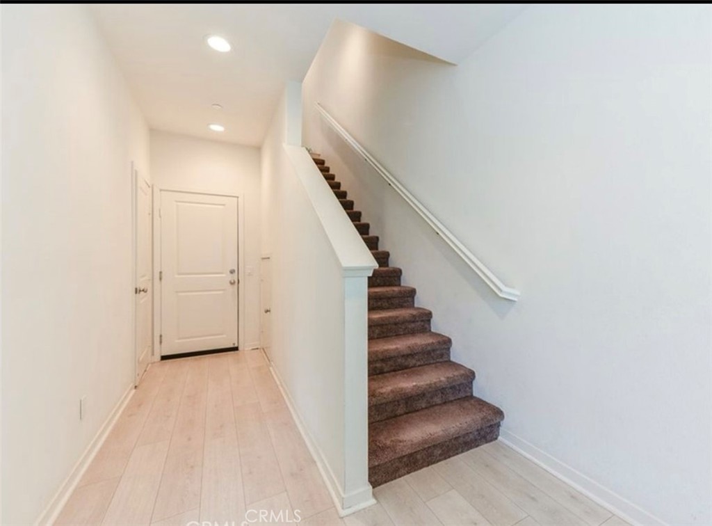 175 Frame Irvine, CA 92618 - Photo 4 of 11 a view of a hallway with staircase