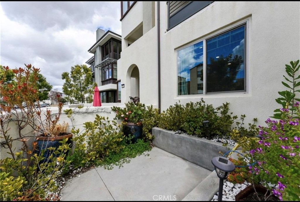 175 Frame Irvine, CA 92618 - Photo 8 of 11 a front view of a house with a yard