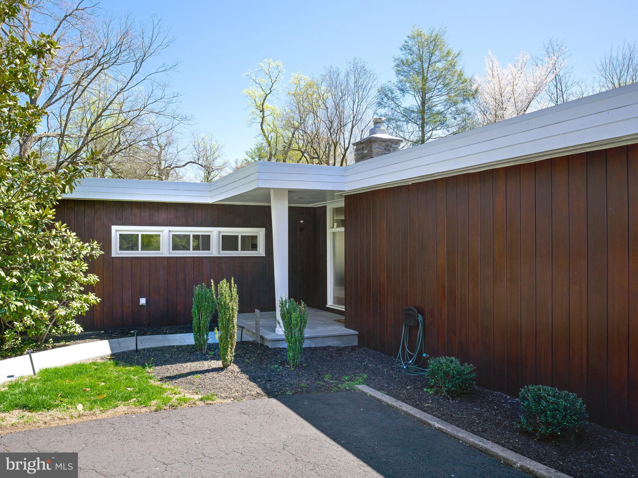 1321 Pepper Road Rydal, PA 19046 - Photo 2 of 49 a front view of a house with a garden
