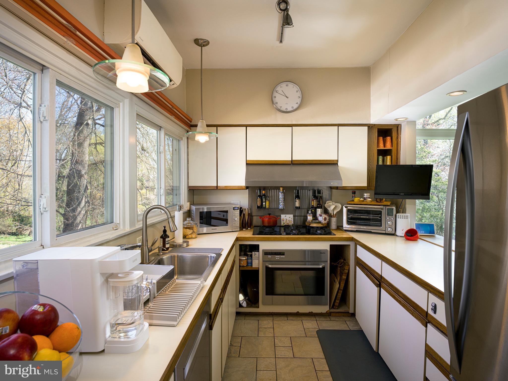 1321 Pepper Road Rydal, PA 19046 - Photo 24 of 49 a kitchen with a sink appliances cabinets and furniture