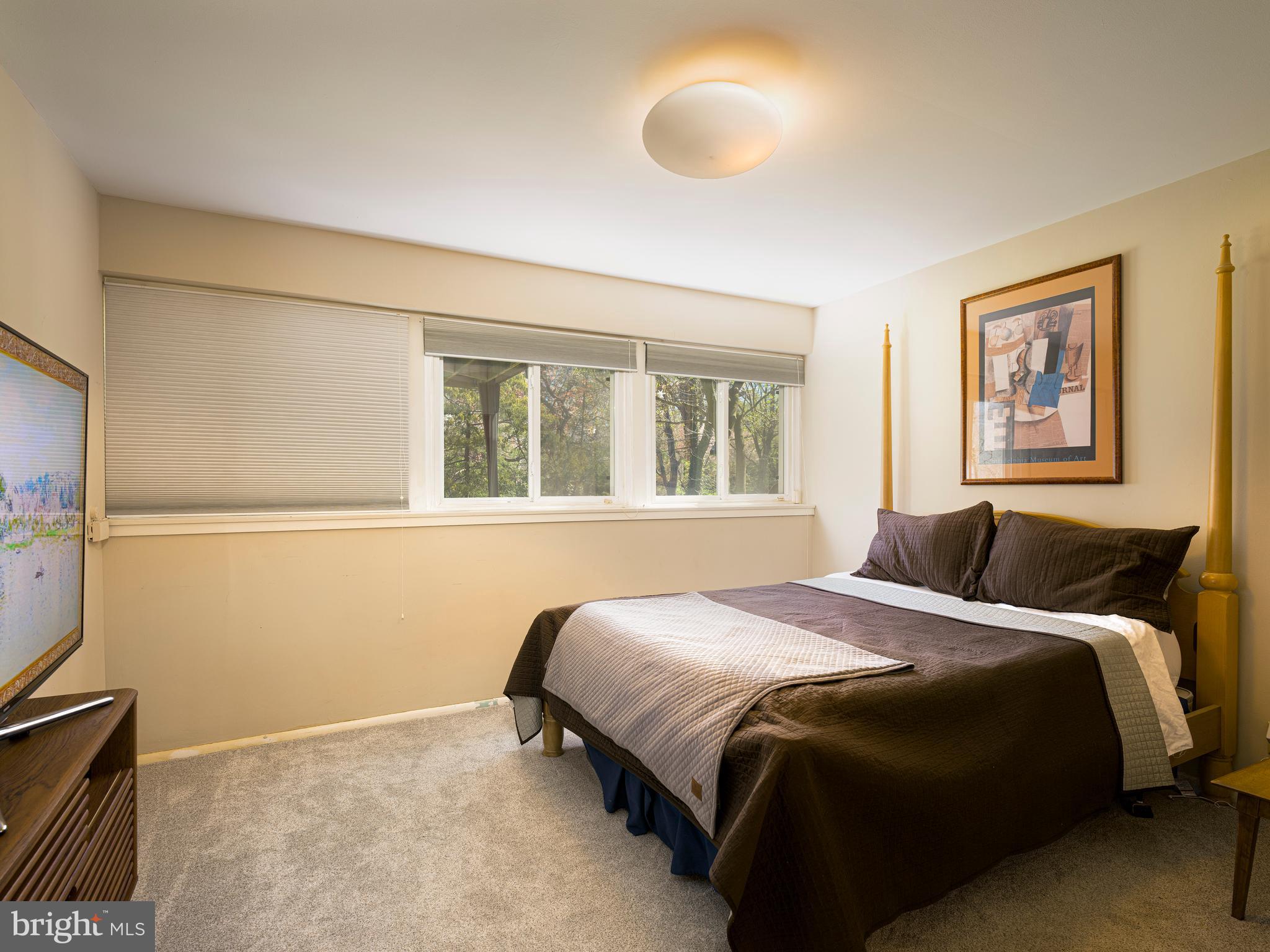 1321 Pepper Road Rydal, PA 19046 - Photo 33 of 49 a bedroom with a bed and a window
