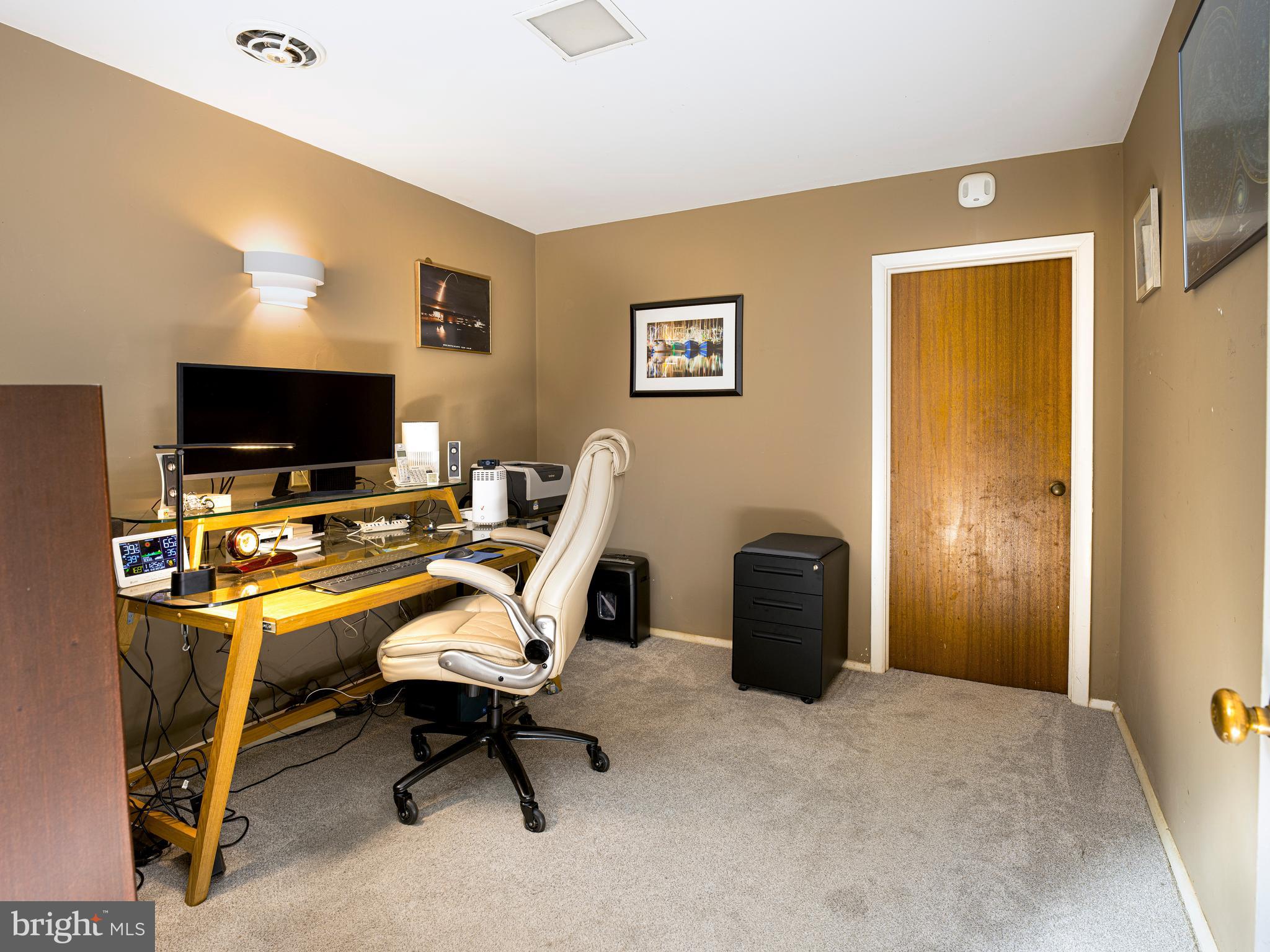 1321 Pepper Road Rydal, PA 19046 - Photo 39 of 49 a view of a workspace with furniture and a window