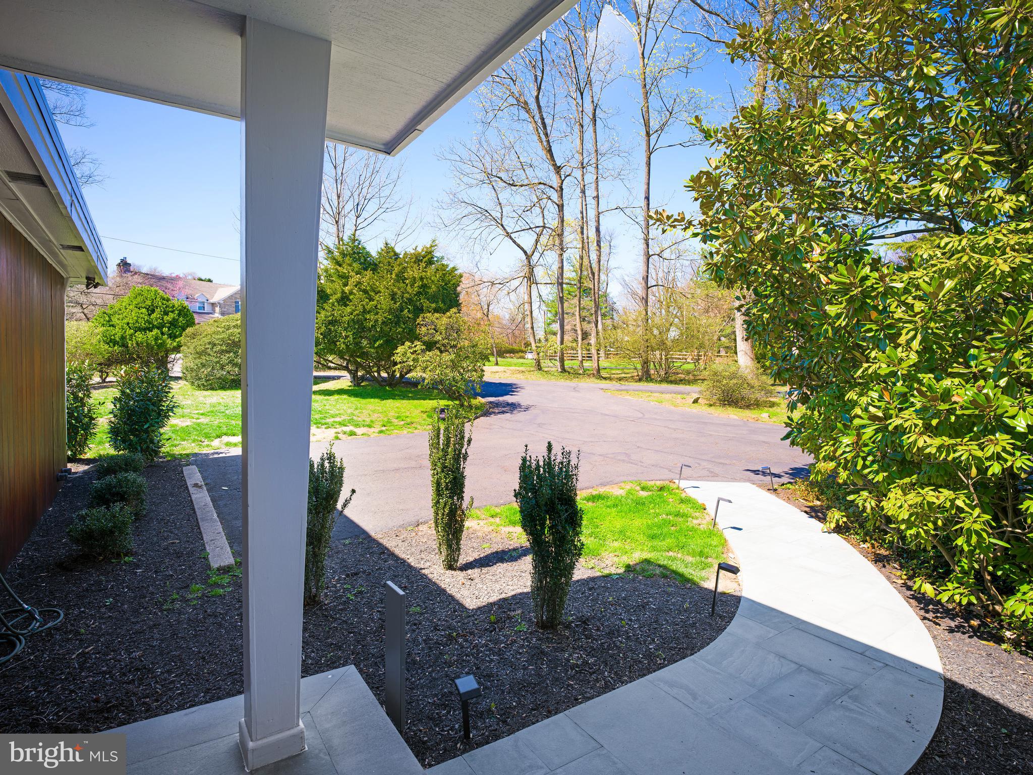 1321 Pepper Road Rydal, PA 19046 - Photo 6 of 49 a view of a back yard with flower plants