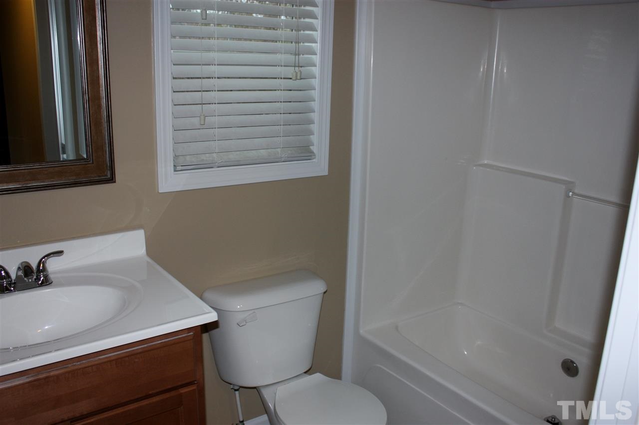 1696 Oak Grove Church Road Angier, NC 27501 - Photo 13 of 16 good space in the guest bath