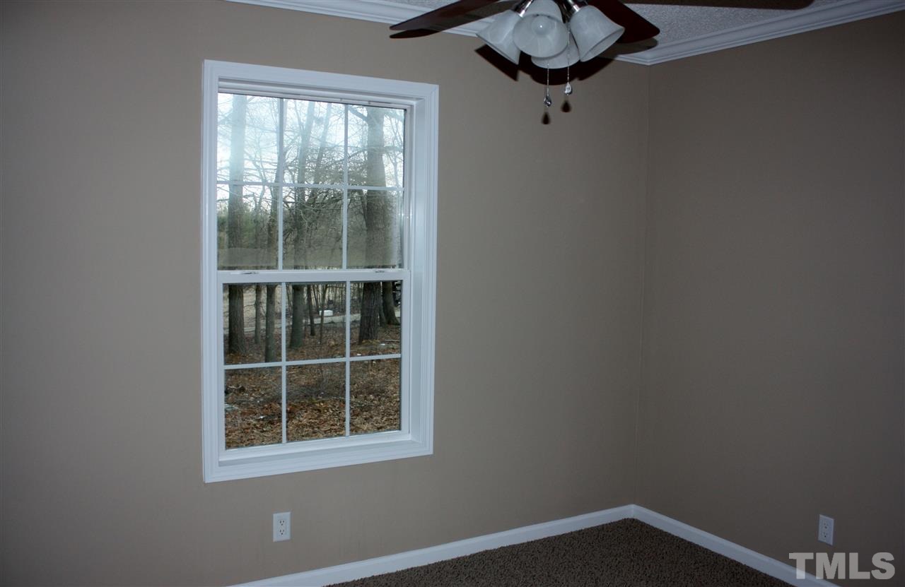 1696 Oak Grove Church Road Angier, NC 27501 - Photo 14 of 16 new carpet, paint and ceiling fan in bedrooms