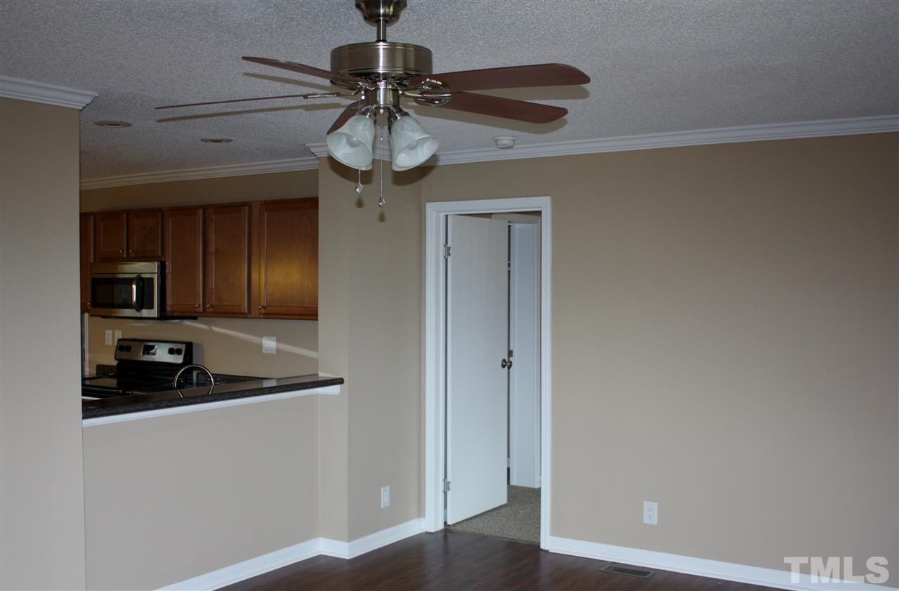1696 Oak Grove Church Road Angier, NC 27501 - Photo 4 of 16 Living room is open to kitchen and has new bamboo wood floors.