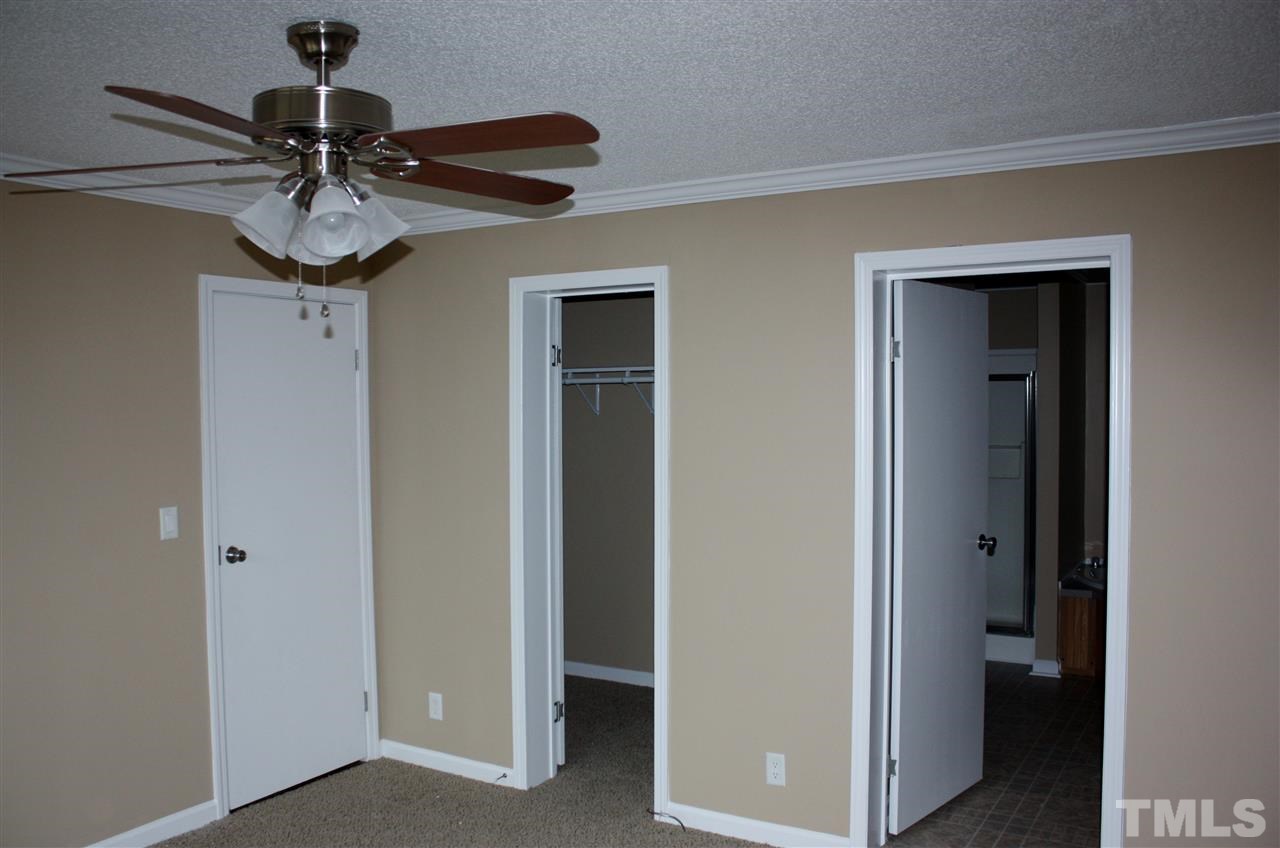 1696 Oak Grove Church Road Angier, NC 27501 - Photo 6 of 16 Master bedroom has a good size walk in closet and large private bath.