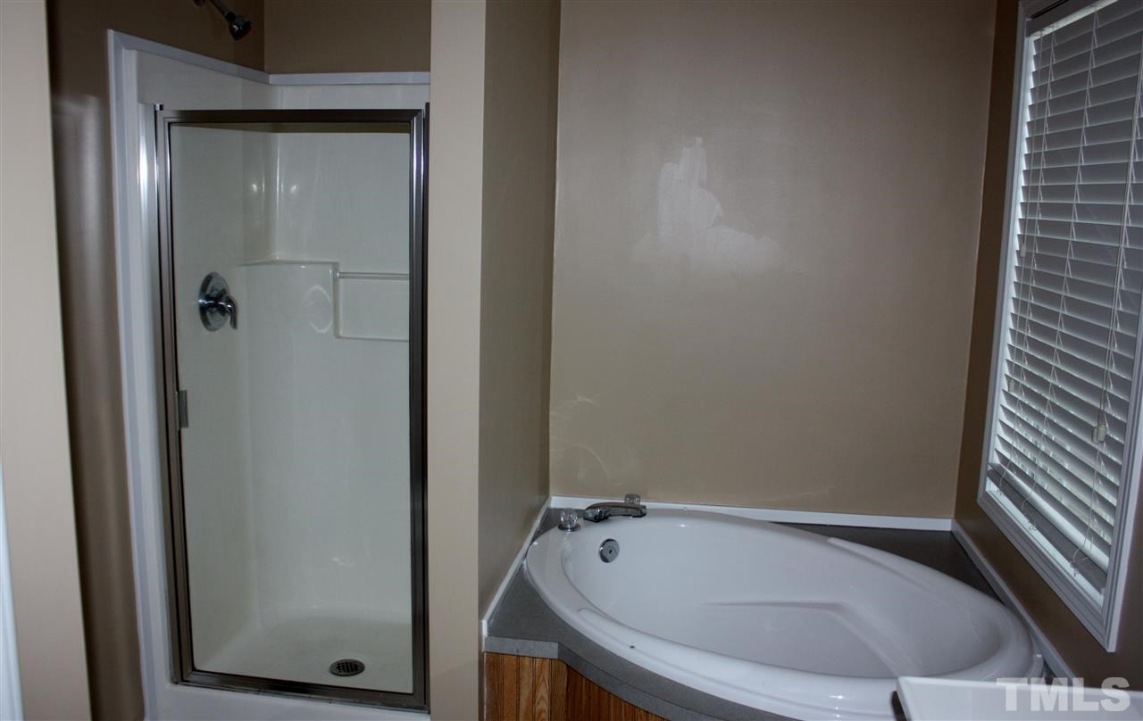 1696 Oak Grove Church Road Angier, NC 27501 - Photo 7 of 16 Separate garden tub and shower in master bath.