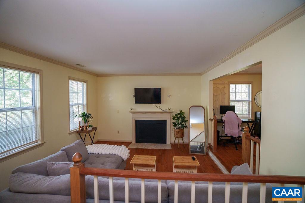 303 Westfield Road Charlottesville, VA 22901 - Photo 3 of 59 a living room with furniture fireplace and flat screen tv
