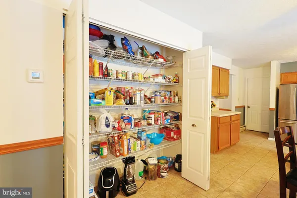 a workspace with furniture window and wooden floor