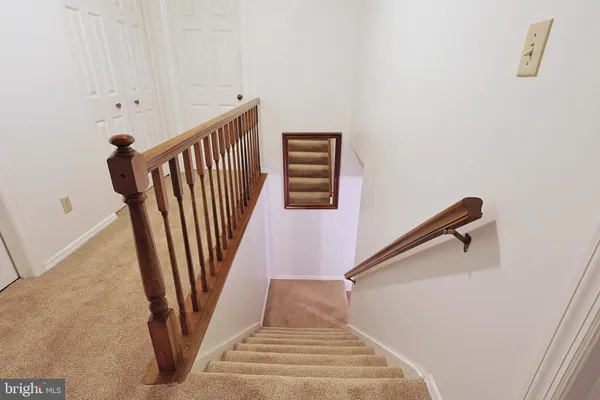 a room with a bed and a window