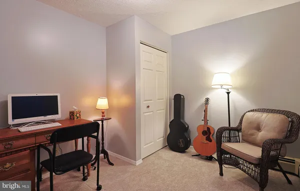 a bathroom with a sink a vanity and a mirror