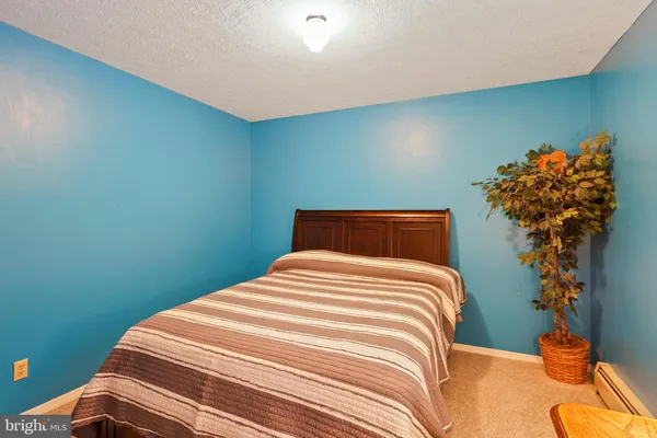 a view of a room with wooden walls