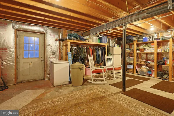 a view of a swimming pool and an outdoor space