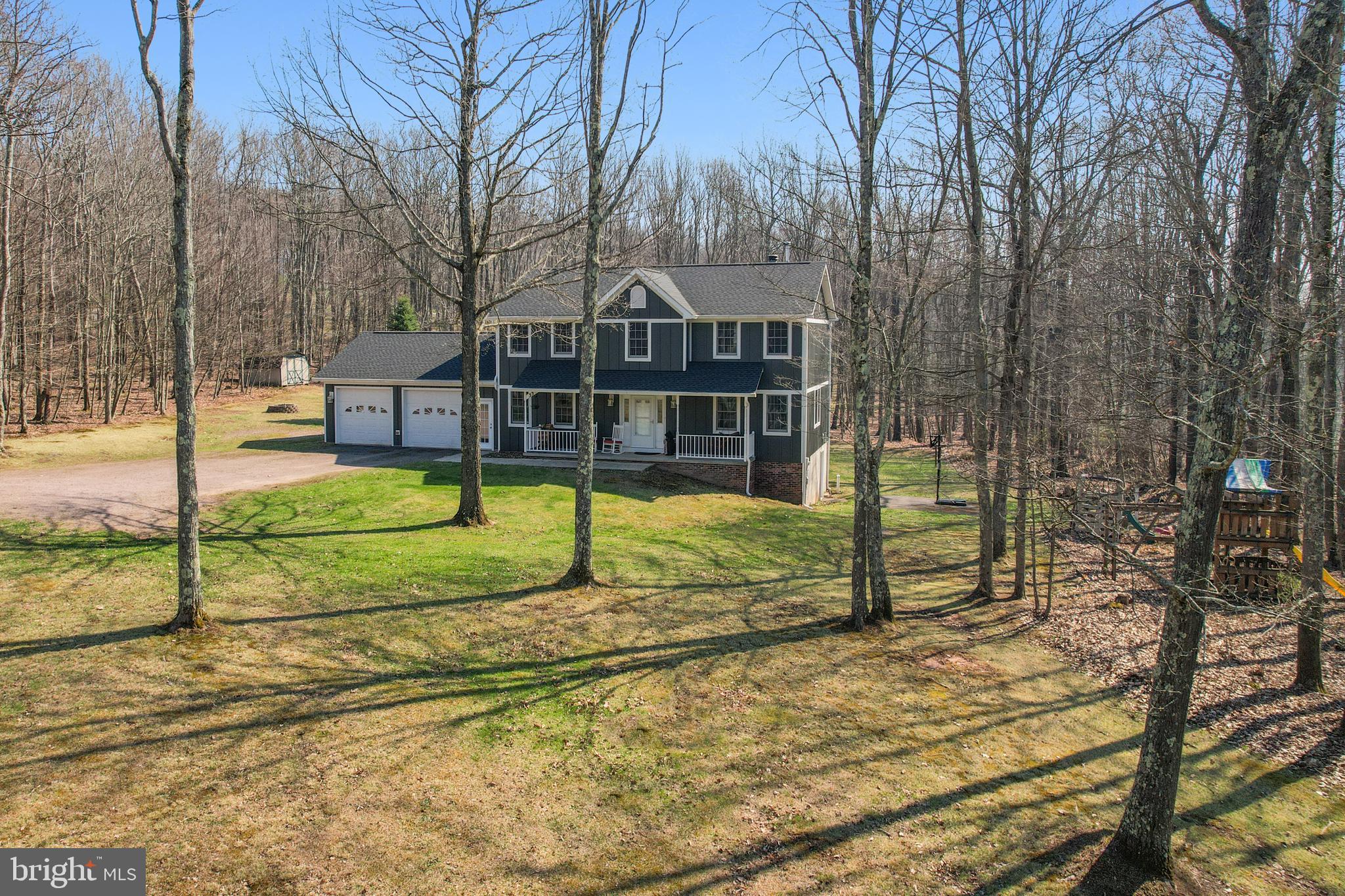 33 Teaberry Ridge Road Lonaconing, MD 21539 - Photo 98 of 101 a view of a house with backyard and a tree