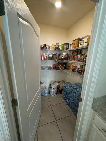 a view of storage and utility room