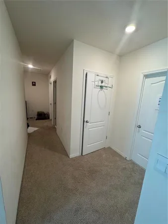 a view of a field with an ocean