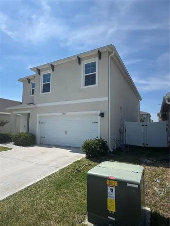 a front view of a house with yard