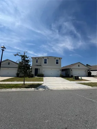 a house view with a garden space