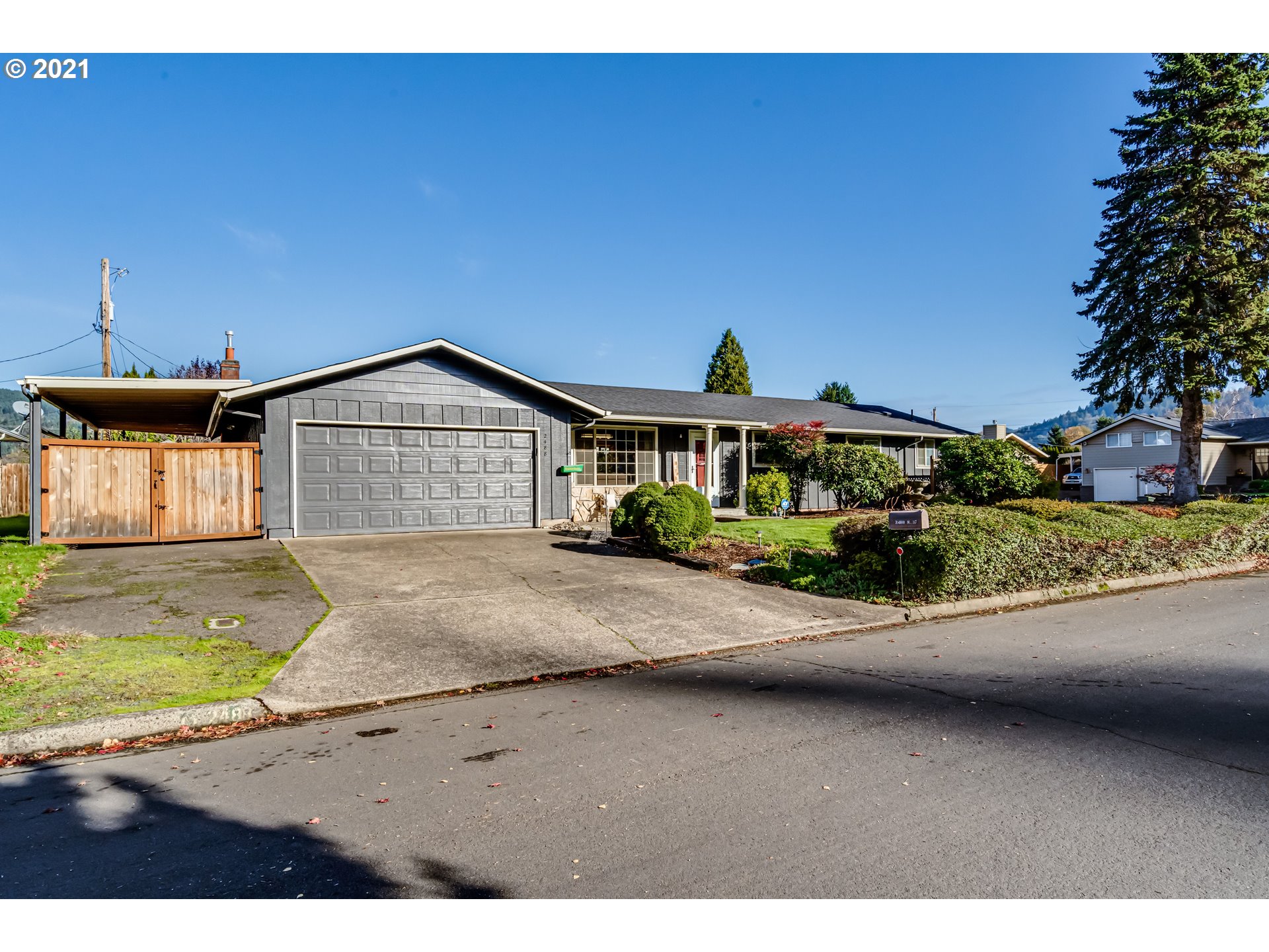 2488 37th Street Springfield, OR 97477 - Photo 1 of 32 a front view of a house with a yard