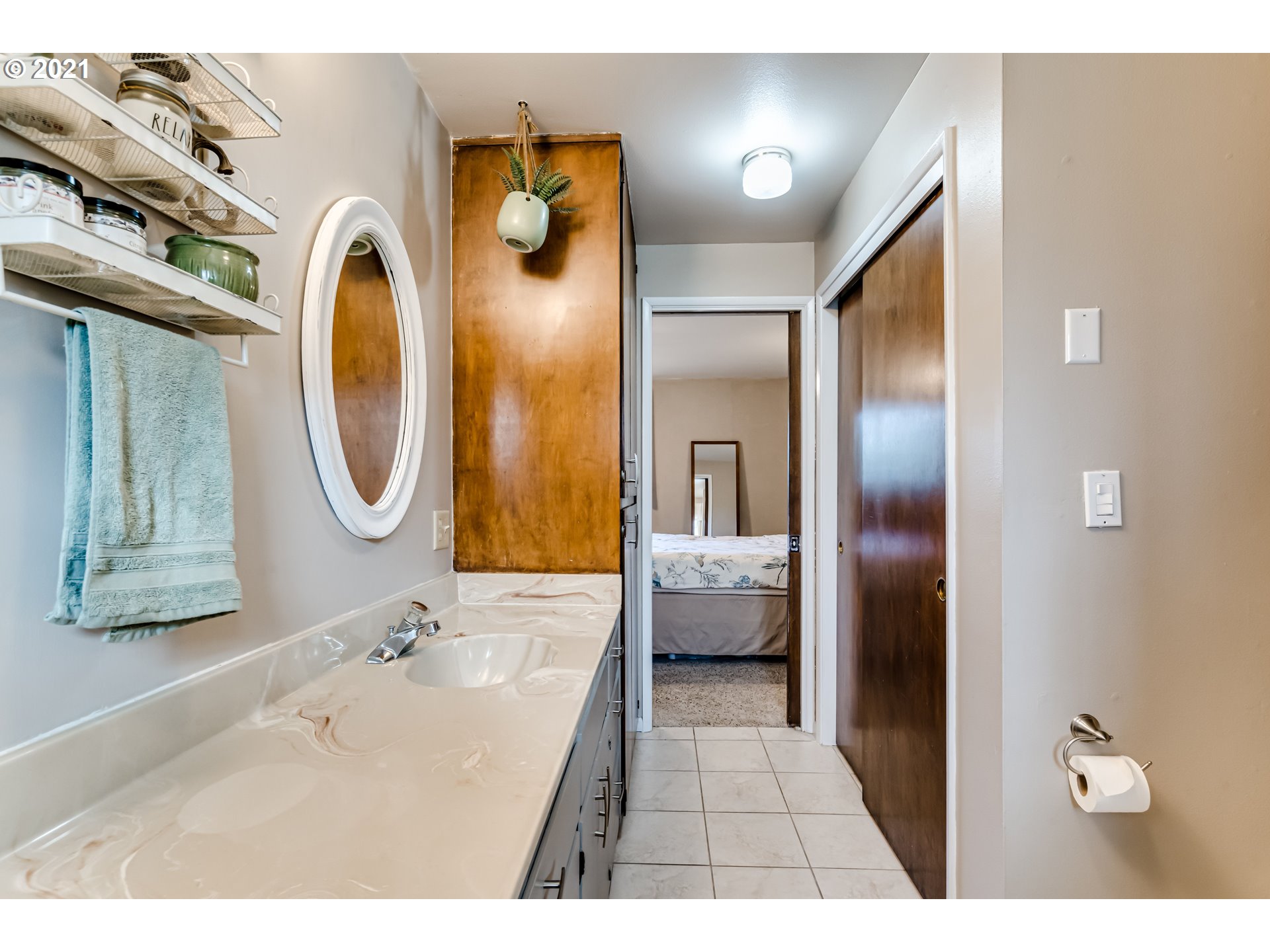 2488 37th Street Springfield, OR 97477 - Photo 23 of 32 a bathroom with a sink and a mirror