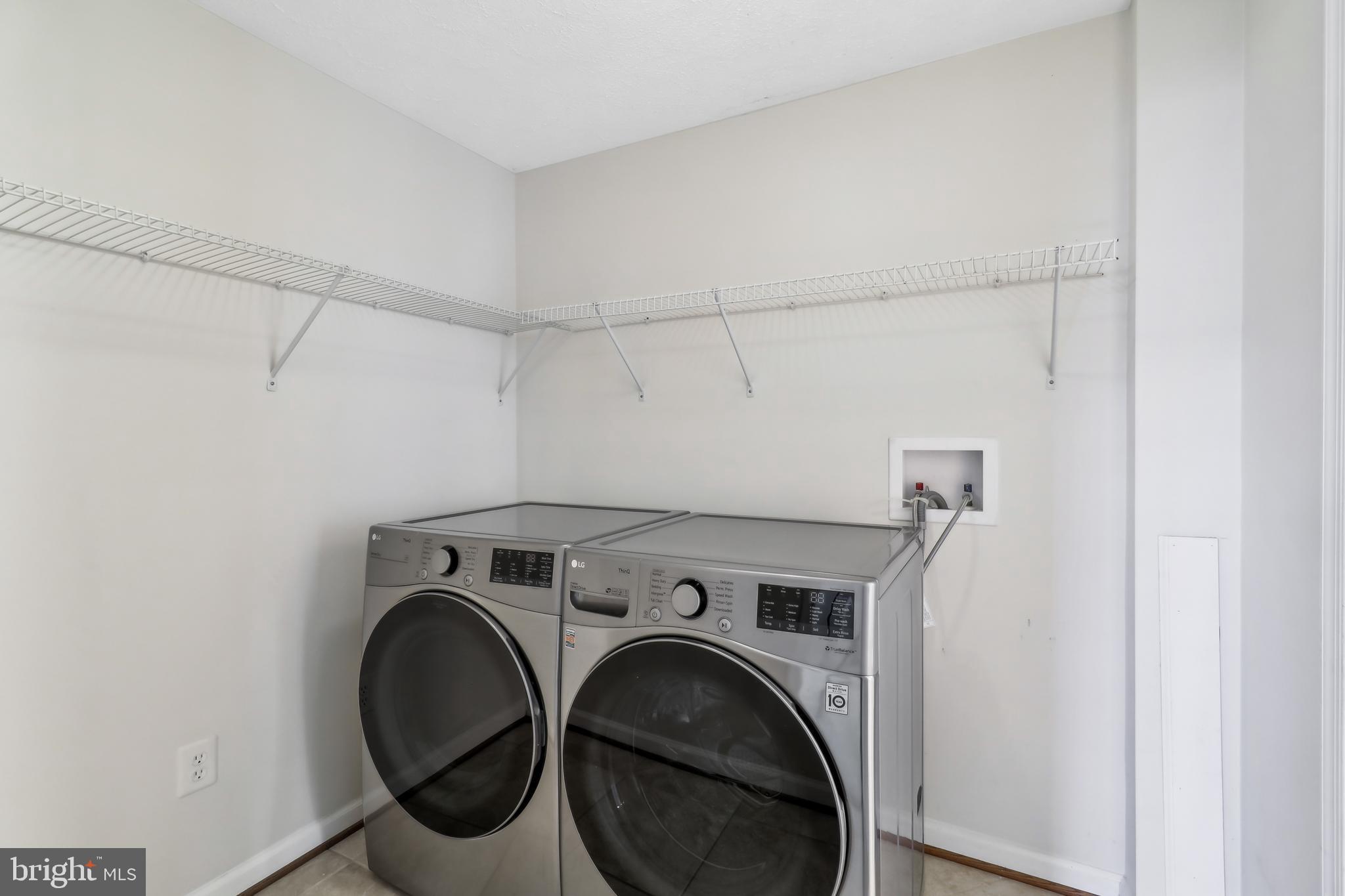 1809 Keymar Road Edgewater, MD 21037 - Photo 24 of 49 a utility room with dryer and washer