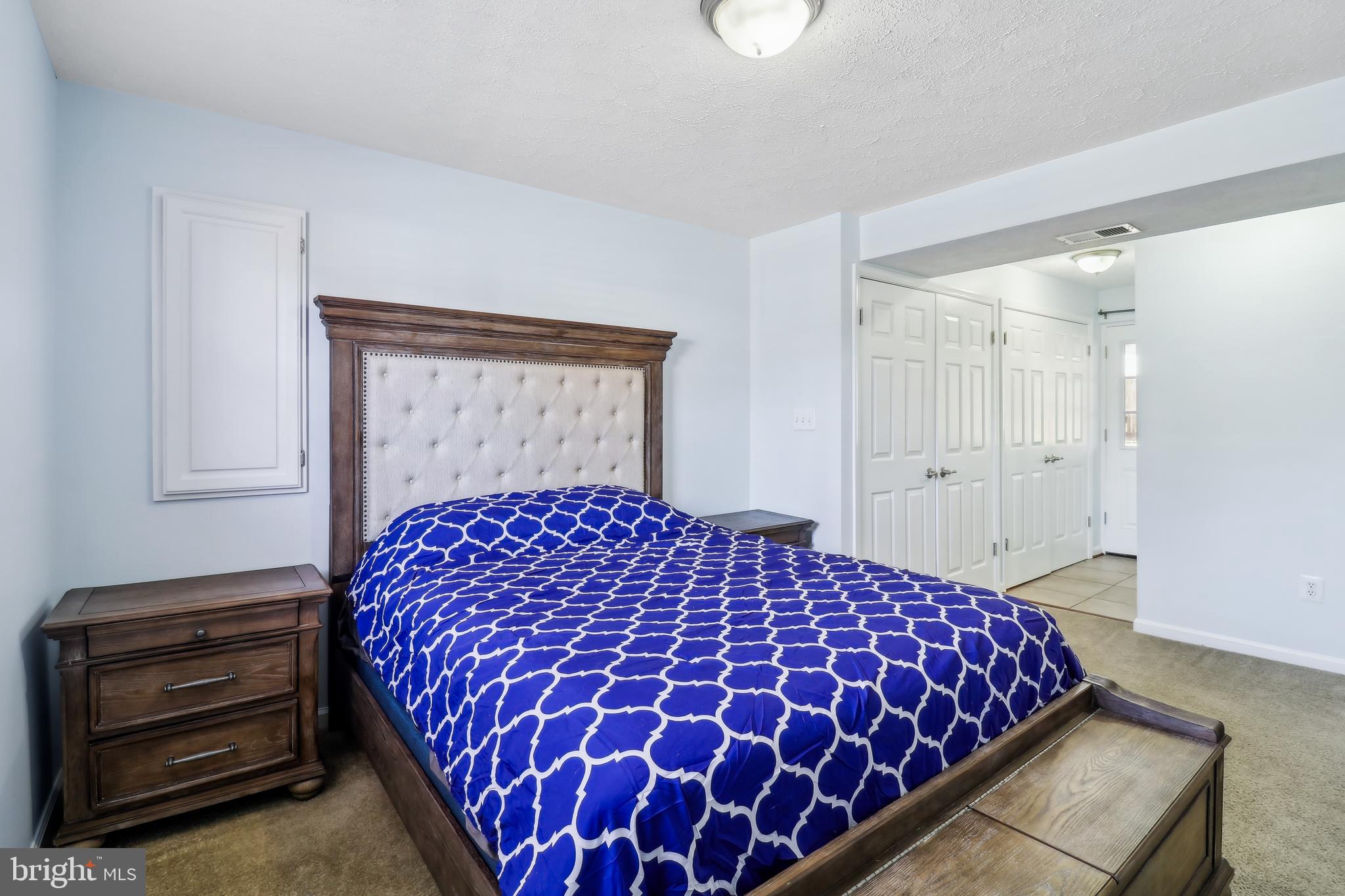 1809 Keymar Road Edgewater, MD 21037 - Photo 26 of 49 a bedroom with a bed and a closet