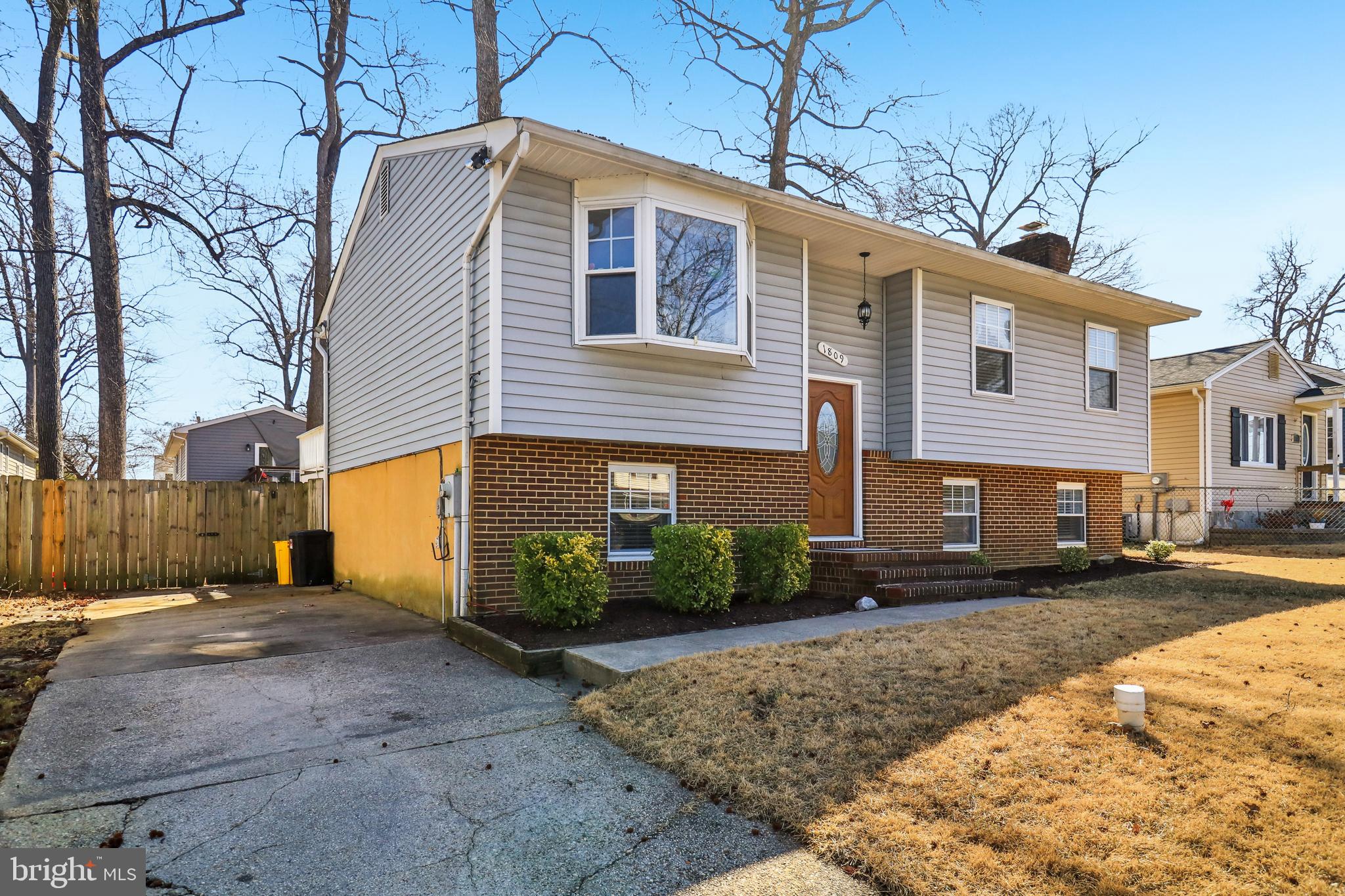 1809 Keymar Road Edgewater, MD 21037 - Photo 3 of 49 a front view of a house with a yard