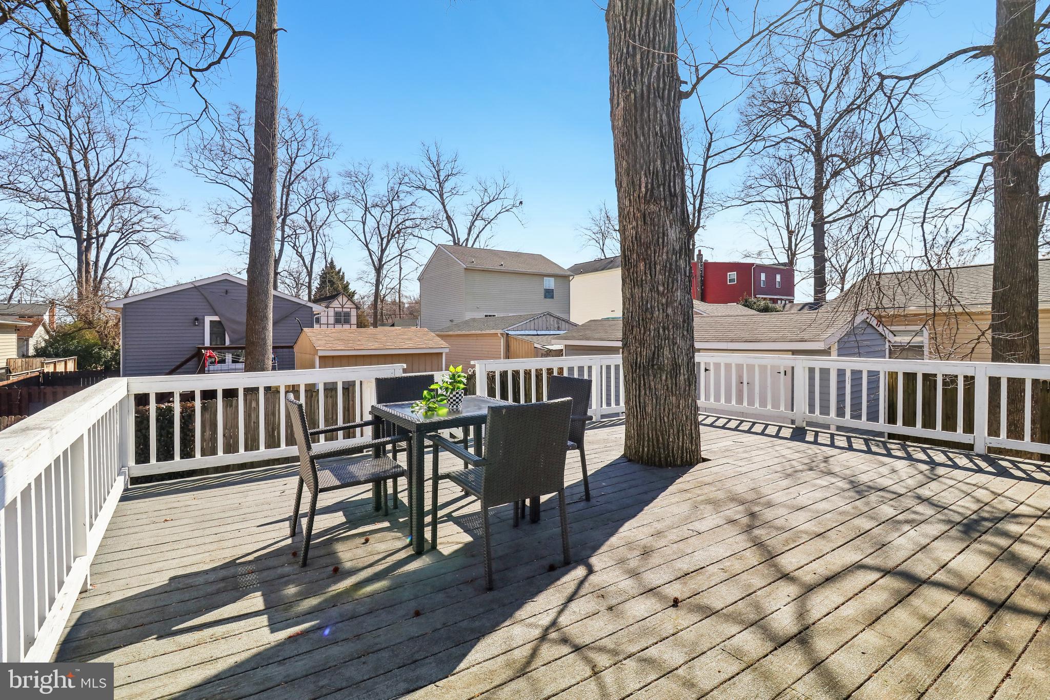 1809 Keymar Road Edgewater, MD 21037 - Photo 32 of 49 a view of a deck with chairs and wooden fence